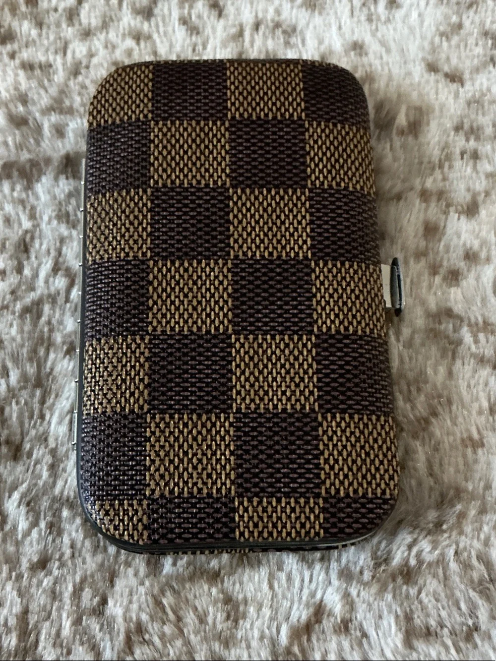 Brown Checker Pattern Case with 8-piece manicure and pedicure grooming kit set.